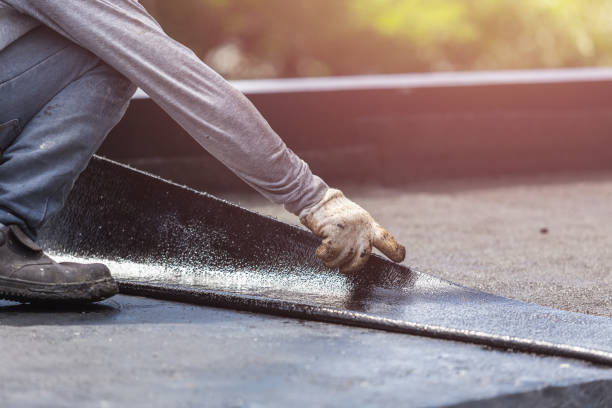 Professional Basement Waterproofing technician working in Gwynneville, IN